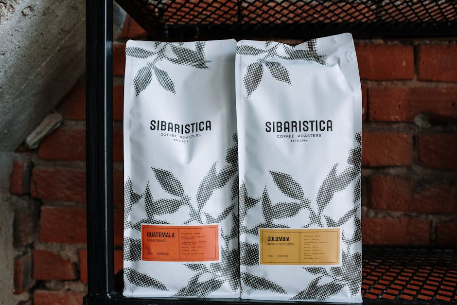 Elegant coffee packaging displayed on industrial shelving in a café.
